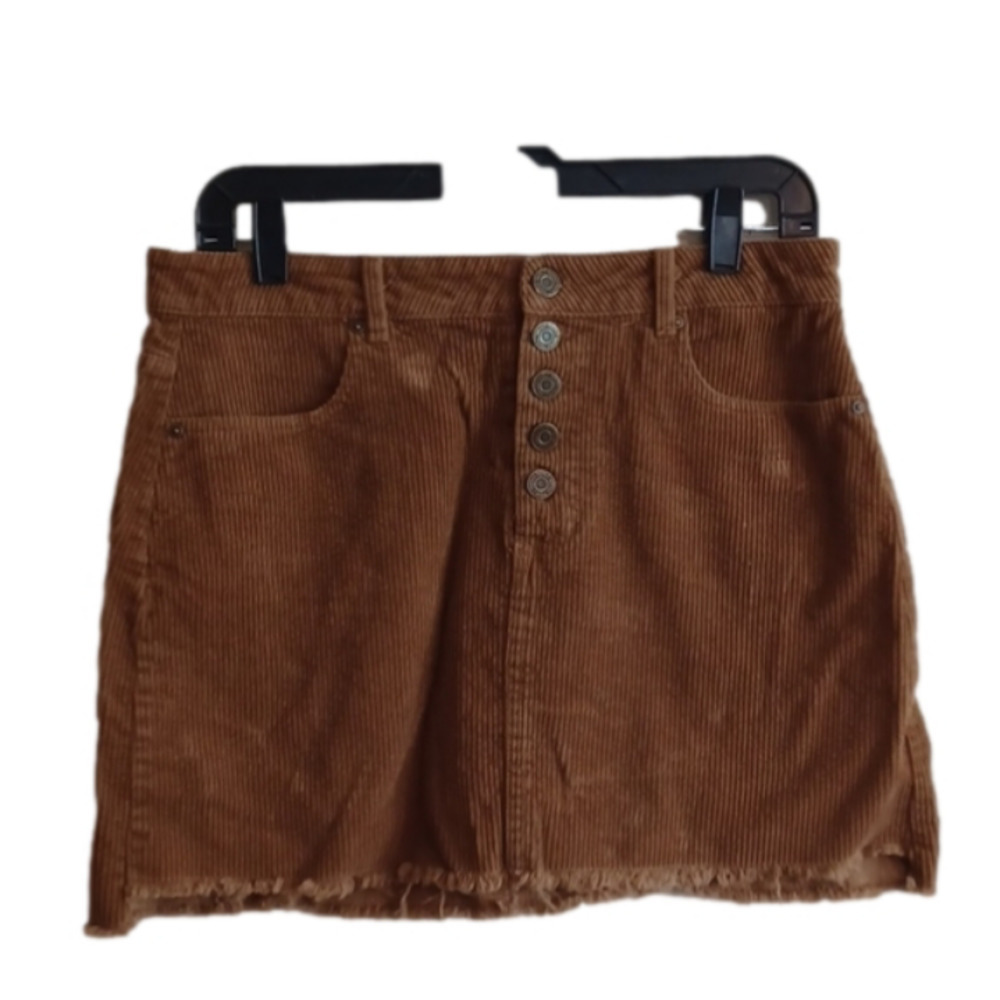 INDIGO Rein tan/ light brown  corduroy mini skirt. Size 9.Buttonfly. Frayed hems
